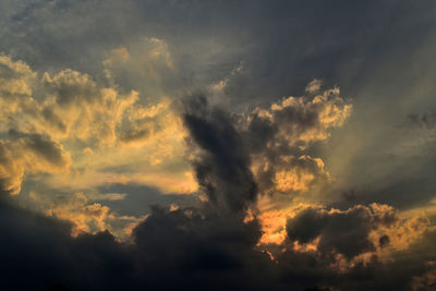 Low angle view of dramatic sky at sunset