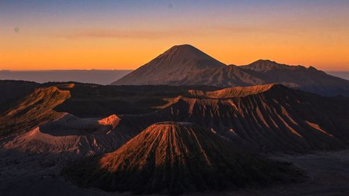 View of volcanic mountain during sunset