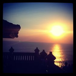 Scenic view of sea at sunset