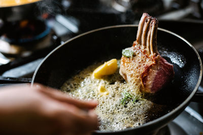 High angle view of meat in cooking pan