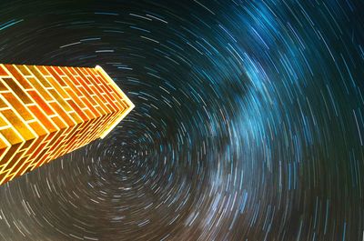 Light painting against sky at night