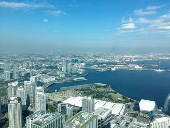 High angle view of city buildings against sky