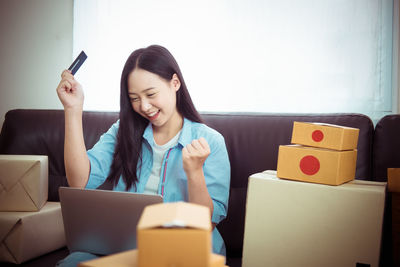 Young woman using mobile phone