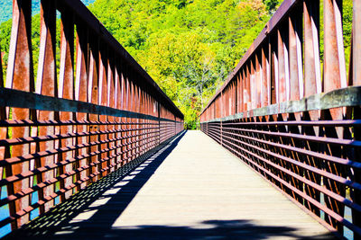 Footbridge against sky