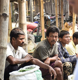 Group of people sitting outdoors