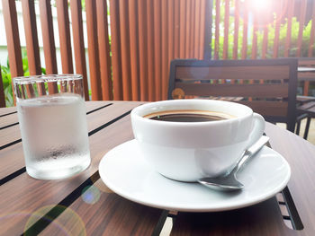 Close-up of coffee cup on table