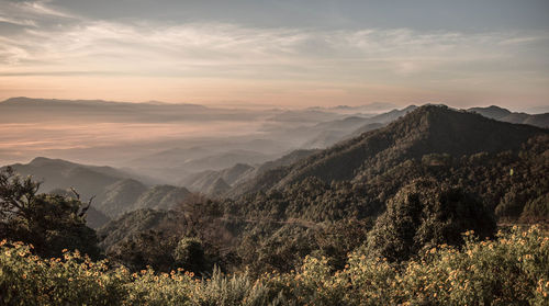 Scenic view of mountains against sky during sunset