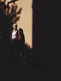 Woman standing at night