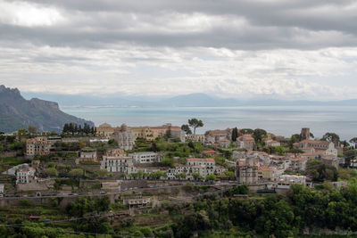 Buildings in city against sky