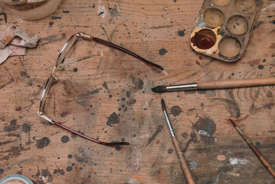 High angle view of artist's workbench