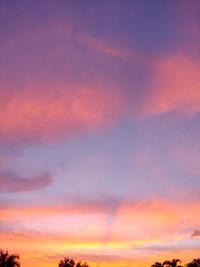 Low angle view of dramatic sky during sunset