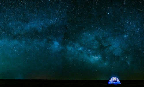 Scenic view of star field against sky at night