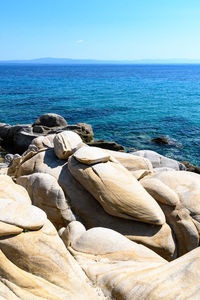 Scenic view of sea against clear blue sky