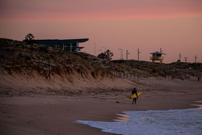 Woman standing on beach