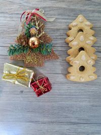 Directly above shot of christmas decorations and cookies on table