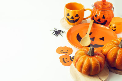 Close-up of pumpkins against white background