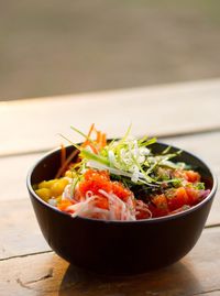 Close-up of salad in bowl on table