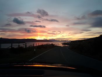 Road against sky during sunset