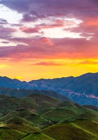 Scenic view of landscape against sky during sunset