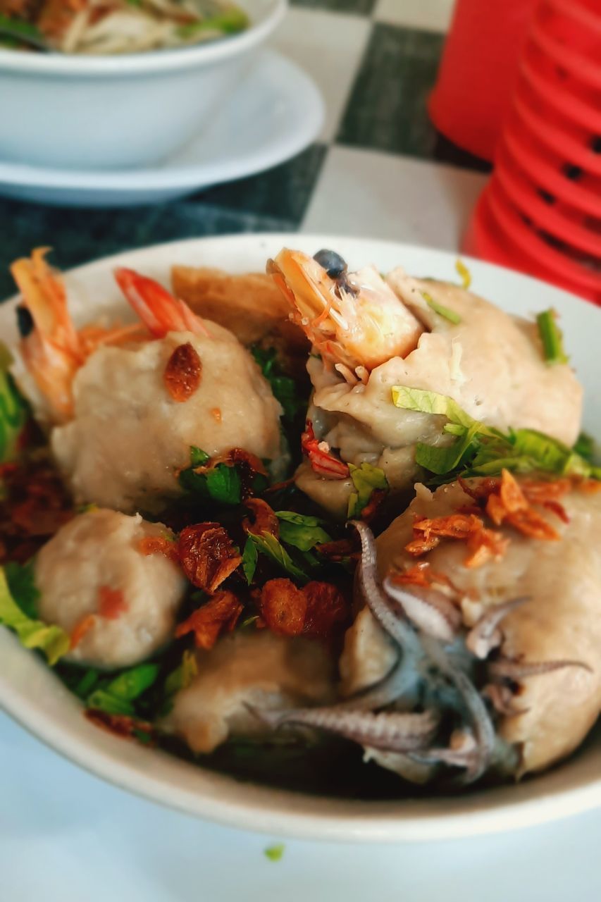 food and drink, food, healthy eating, seafood, dish, plate, freshness, wellbeing, meal, crustacean, vegetable, shrimp, no people, thai food, meat, cuisine, close-up, selective focus, fish, indoors, dinner, animal, table, crockery, bowl, restaurant