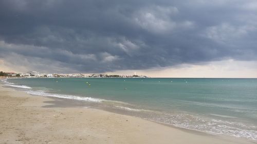 Scenic view of beach against sky