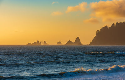 Scenic view of sea against sky during sunset