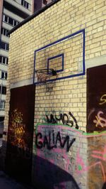 Graffiti on brick wall