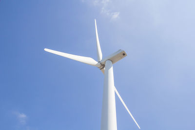 Low angle view of wind turbine against sky