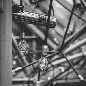 Close-up of light bulb hanging