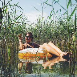 Young woman in lake