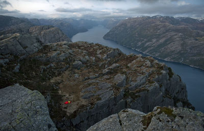 Tent in mountains by fjord