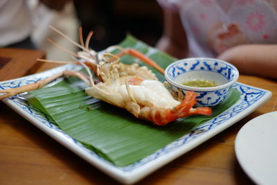 Close-up of food served in plate on table