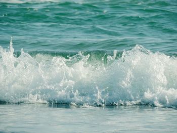 Waves splashing on shore