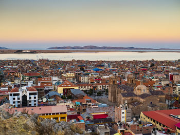 High angle view of townscape against sky during sunset