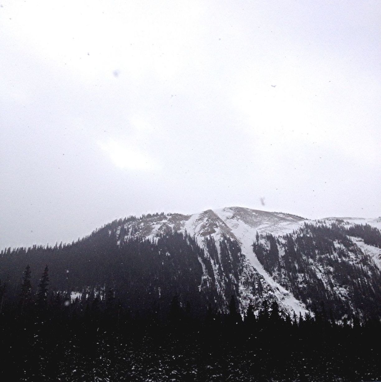 mountain, snow, winter, cold temperature, tranquil scene, tranquility, scenics, mountain range, beauty in nature, weather, season, nature, landscape, snowcapped mountain, clear sky, copy space, non-urban scene, covering, idyllic, sky