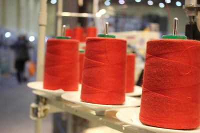 Colorful containers red thin sewing wire roll