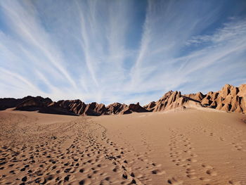 Panoramic view of desert against sky