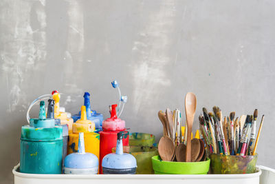 Close-up of paintbrushes on table