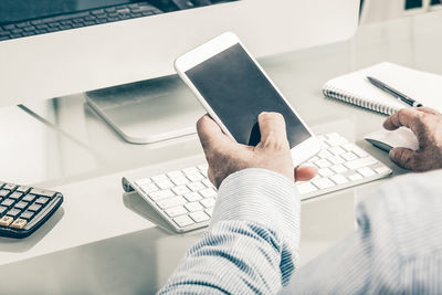 High angle view of man using laptop