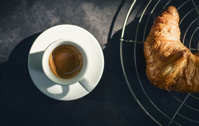 High angle view of coffee served on table