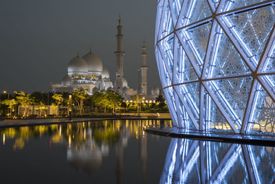 Shiekh zayed grand mosque,  featuring the glass domes of the underground visiter center entrance