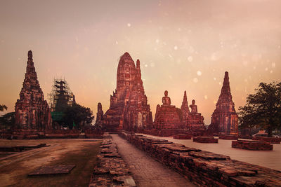 Panoramic view of buildings against sky at sunset