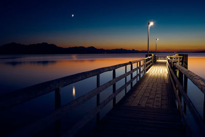 Pier over sea against sky