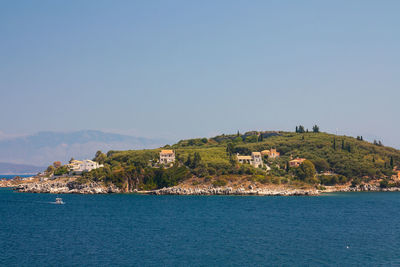 Scenic view of calm sea against clear sky