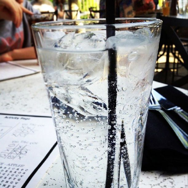 drink, food and drink, drinking glass, refreshment, table, indoors, freshness, glass - material, alcohol, close-up, still life, restaurant, transparent, glass, drinking straw, focus on foreground, cold temperature, ice cube, cocktail, wineglass