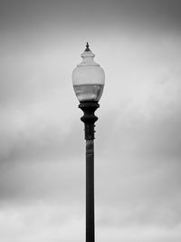 Low angle view of street light against sky