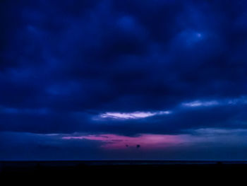 Scenic view of dramatic sky during sunset