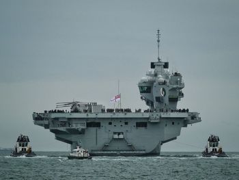 Ship in sea against clear sky