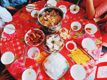 High angle view of person preparing food on table