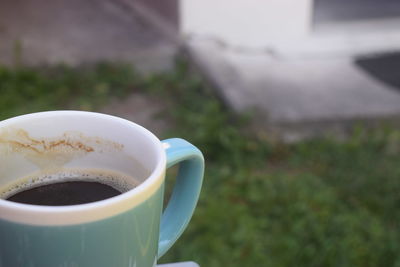 Close-up of coffee cup on table